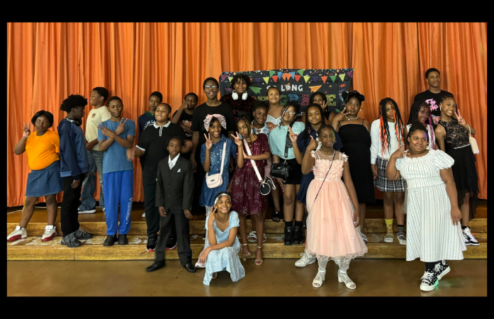  picture of 5th grade class on stage at dinner dance